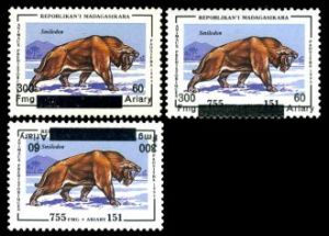 prehistoric animal Smilodon on surcharged stamp of Madagascar 1998