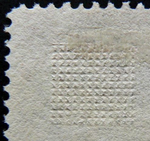 G grill on a stamp of the 1869 issue