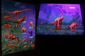 Dinosaurs on stamps of China 2017 stamps under UV light