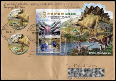 Dinosaur stamps of North Korea on letter to Germany