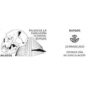 Museum of Human Evolution in Burgos and skull of Homo heidelbergensis or an early Neanderthal man on postmark of Spain 2020