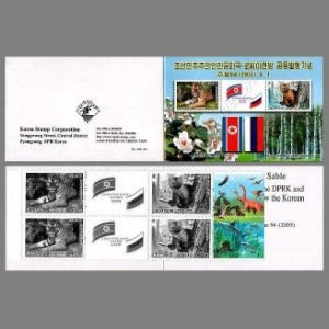 Dinosaurs on sheet margin of stamps North Korea 1996