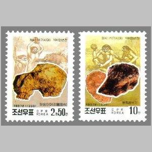 stone tools and hominids on Korean Central History Museum stamps of North Korea 1998