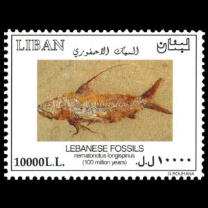Fossil of prehistoric fish on stamp of Lebanon 2002